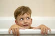 Cunning three years boy in a bathtub