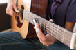 Teenage Boy playing Acoustic Guitar