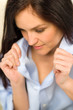 Photo: Close up of woman adjusting her shirt Close up of woman adjusting her shirt