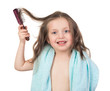 girl combs her hair