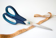 Scissors and measuring tape stretched