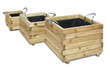 A set of wooden boxes for flowers isolated over white.
