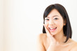 attractive asian woman skin care image
