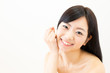 attractive asian woman skin care image