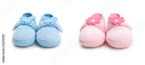 Photo: Two pairs of baby boy and girl shoes Two pairs of baby boy and girl shoes