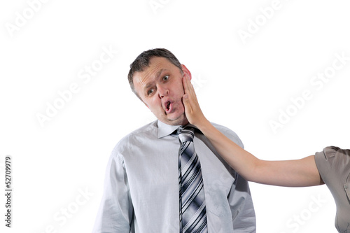Photo: Woman hand slapping man's face Woman hand slapping man's face