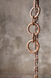 Old weathered industrial chain with rings