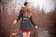 Portrait of a young girl in a winter park