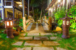 wooden bridge in the light of lanterns