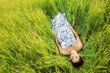 Pregnant caucasian woman takes rest outdoor