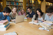 Students learning in a library