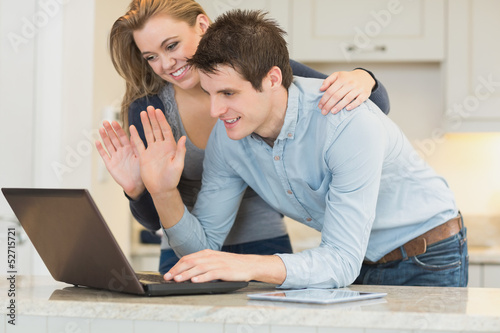 Photo: Couple chatting via webcam Couple chatting via webcam