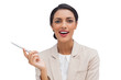 Smiling businesswoman holding a pen