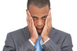 Foto: Stressed young businessman holding her head between hands Stressed young businessman holding her head between hands