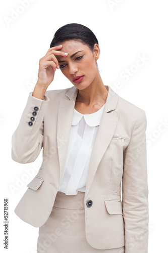Photo: Worried businesswoman holding her head Worried businesswoman holding her head