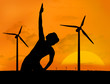 Woman practicing yoga under sunset