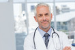 Serious doctor with arms crossed