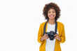 Pretty girl holding a camera