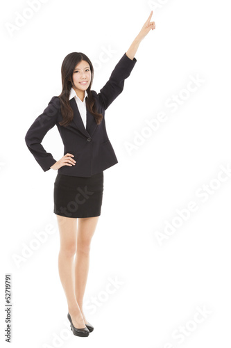 Photo: happy businesswoman pointing to copy space happy businesswoman pointing to copy space