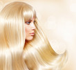 Blond Hair. Fashion Girl With Healthy Long Smooth Hair