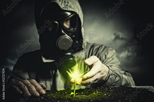 Photo: Young man in a protective suit Young man in a protective suit