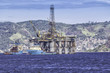 Oil drilling rig against panorama of Rio de Janeiro