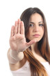 Pretty teenager girl making stop gesture with her hand