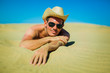 Photo: sexy young man at the beach sexy young man at the beach