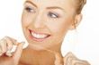 woman brushing her teeth