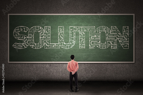 Photo: Businessman looking at solution Businessman looking at solution
