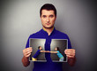 man holding the photo of young couple