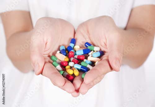 Photo: Pills in hands Pills in hands