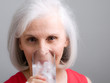Senior Attractive Woman Drinking Water