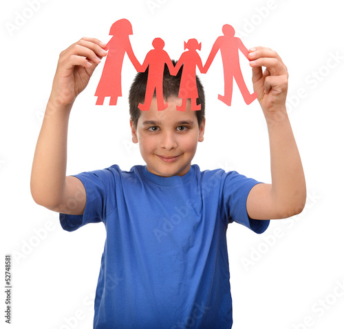 Photo: Happy child with paper family in hands isolated on white Happy child with paper family in hands isolated on white