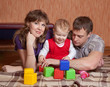 parents and child  at home