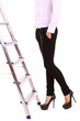 Woman climbing up ladder isolated on white