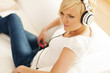 Beautiful Woman Listening To M...