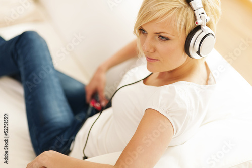 Photo: Beautiful woman listening to music Beautiful woman listening to music