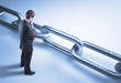 man looking at chain