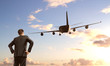 businessman looking on  airplane