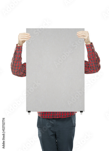 Photo: man holding poster man holding poster