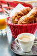 Breakfast with coffee and croissants