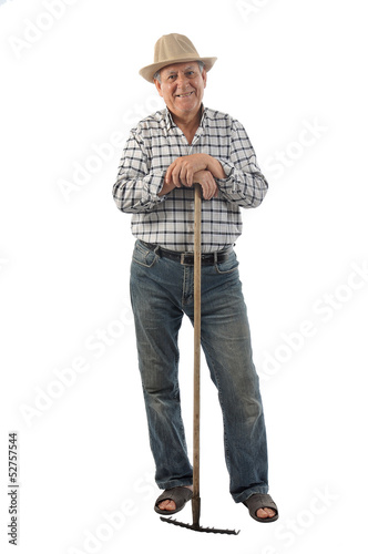Photo: a farmer with a rake a farmer with a rake