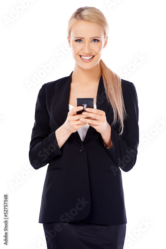 Photo: Happy business woman using cell phone Happy business woman using cell phone