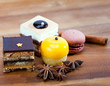 Photo: Small cakes on a wooden tray Small cakes on a wooden tray