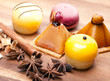 Photo: Small cakes on a wooden tray Small cakes on a wooden tray