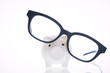 White piggy bank with glasses