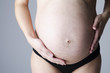 In the picture you can see a pregnant woman
