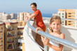 Photo: Mother and daughter on balcony of room at hotel Mother and daughter on balcony of room at hotel