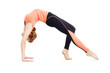 Beautiful sporty woman doing stretching exercise
